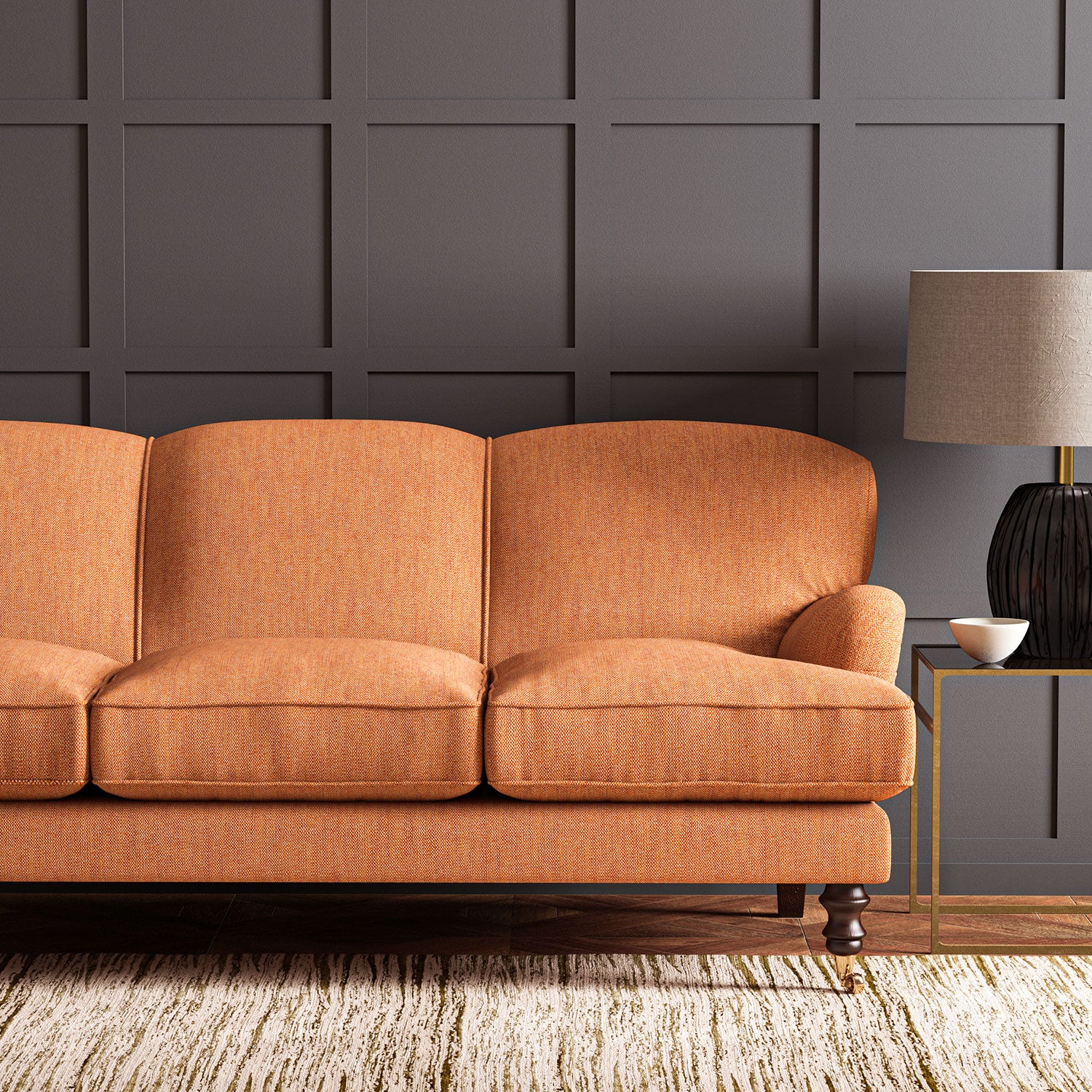 Sofa in Linwood’s Loxley Marmalade – Italian-woven orange fabric with tactile texture and versatility.
