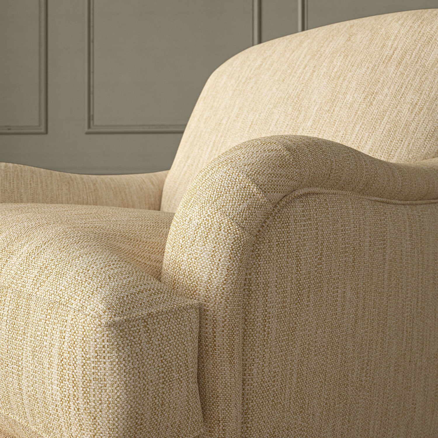 Close-up of armchair in Loxley Oatmeal by Linwood – durable, Italian-woven natural fibre fabric in warm neutral tones.