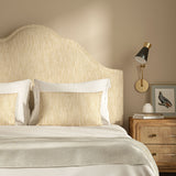Upholstered headboard in Loxley Oatmeal by Linwood – Italian-woven neutral weave.