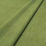 Close-up of Linwood’s Loxley Pistachio fabric – textured Italian weave in soft green for upholstery.