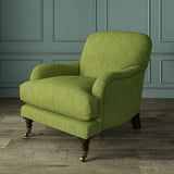 Armchair in Loxley Pistachio by Linwood – durable, Italian-woven natural fibre fabric in muted green.