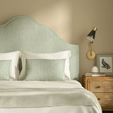 Upholstered headboard in Loxley Powder Blue by Linwood – Italian-woven blue weave.