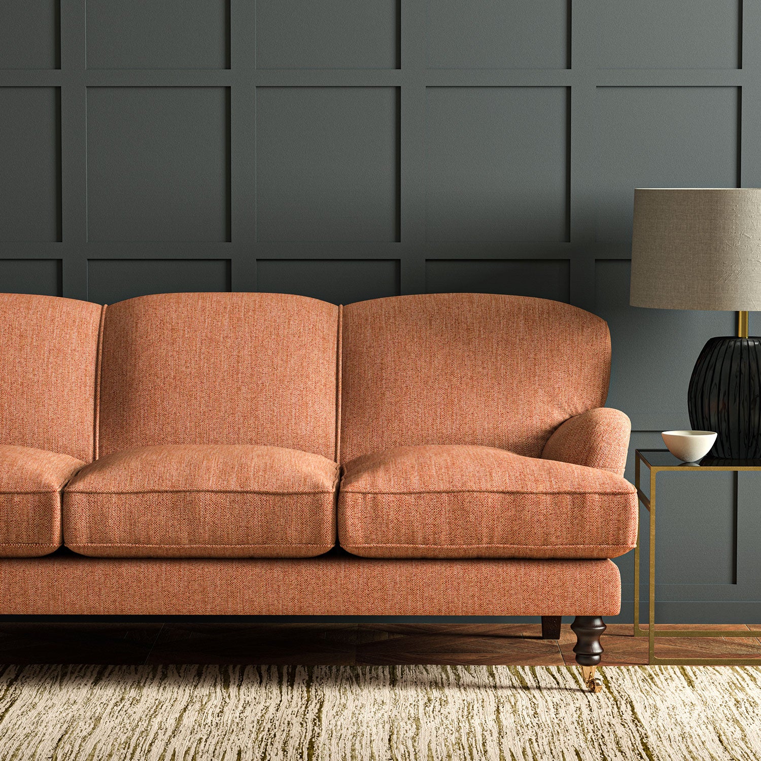 Sofa in Linwood’s Loxley Punch – Italian-woven pink-red fabric with tactile texture and versatility.