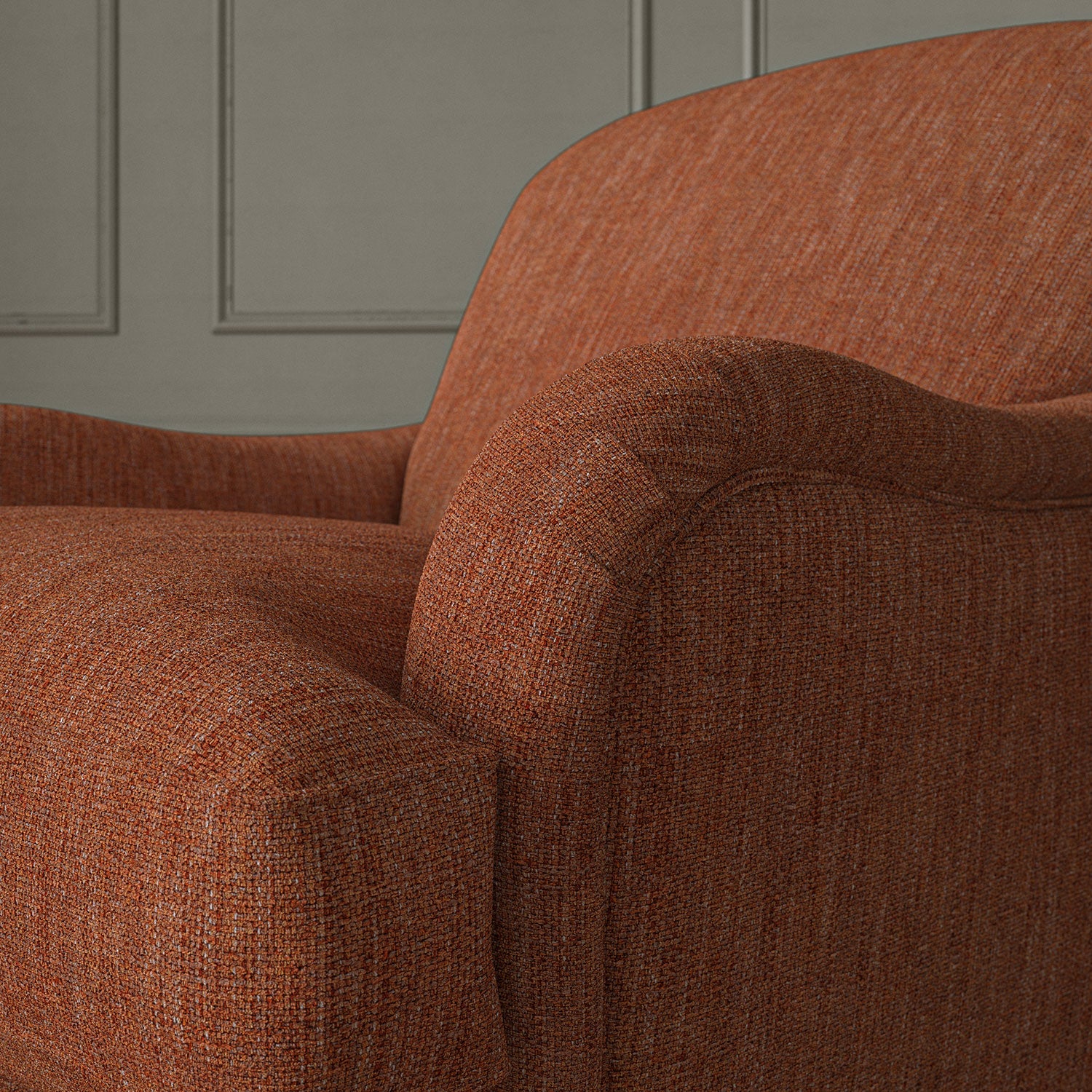 Close-up of armchair in Loxley Redwood by Linwood – durable, Italian-woven natural fibre fabric in deep russet.