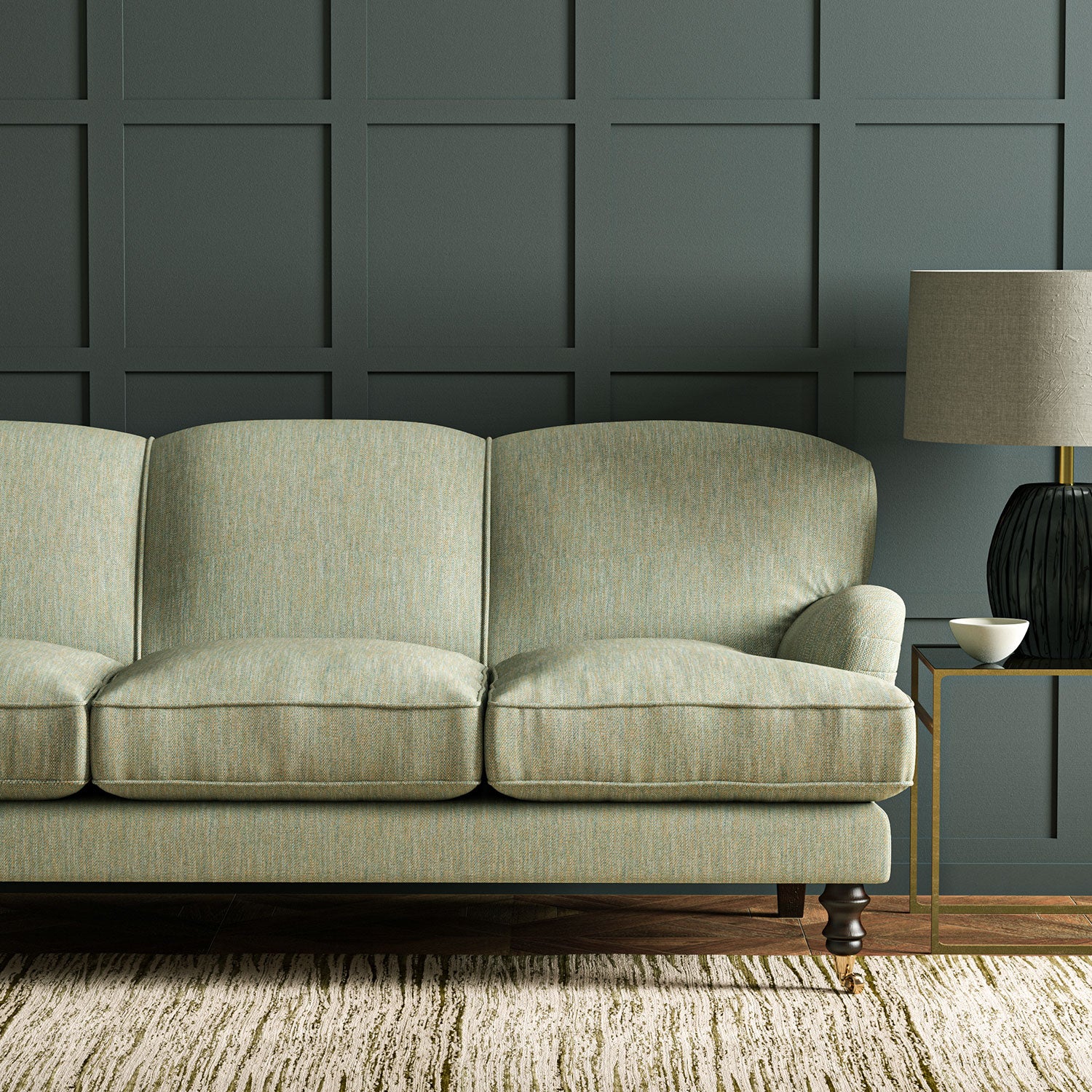 Sofa in Linwood’s Loxley Seagreen – Italian-woven green fabric with tactile 
texture and versatility.


