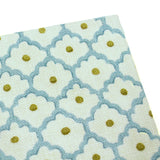 A blue, yellow, cream linen notebook with a classic trellis pattern.