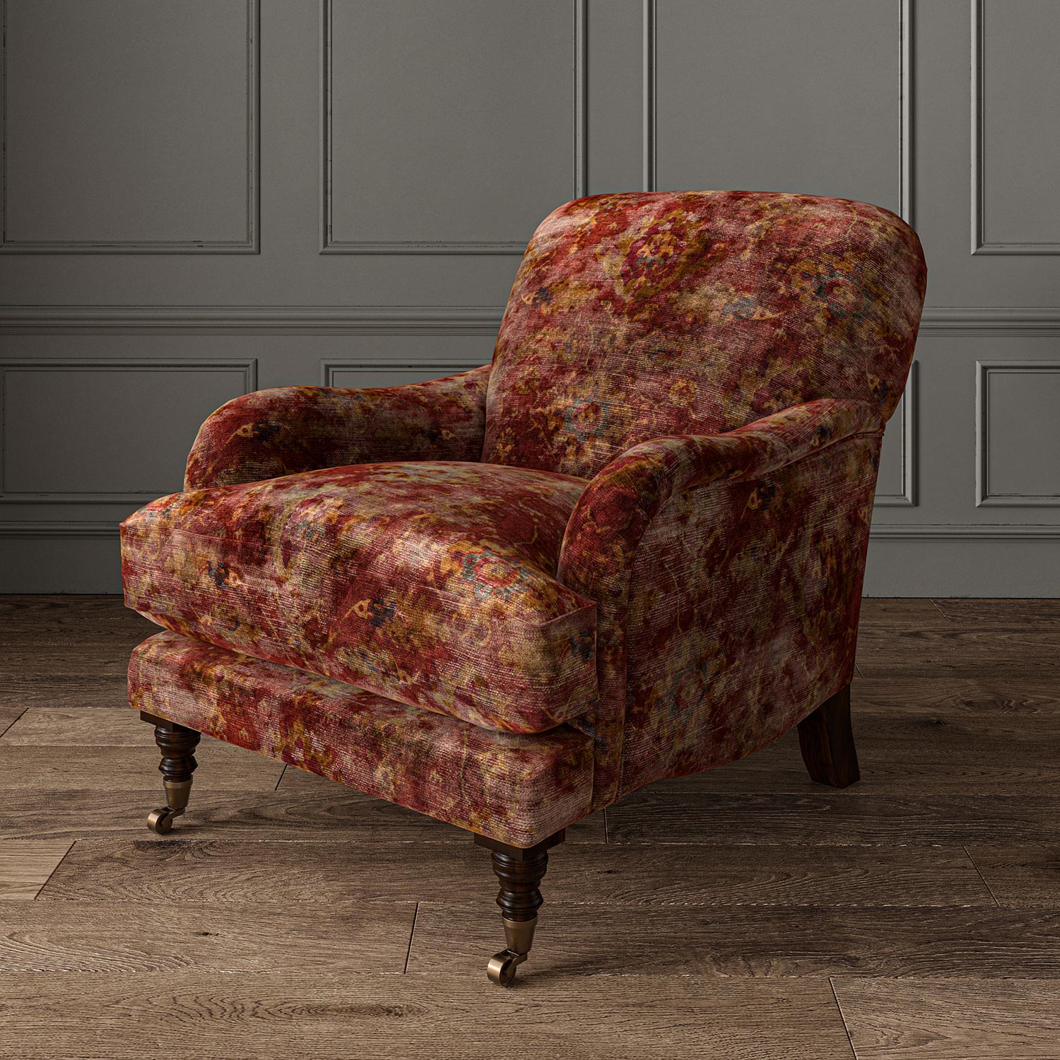 Armchair upholstered in a printed velvet fabric in red and brown featuring a classic distressed pattern.