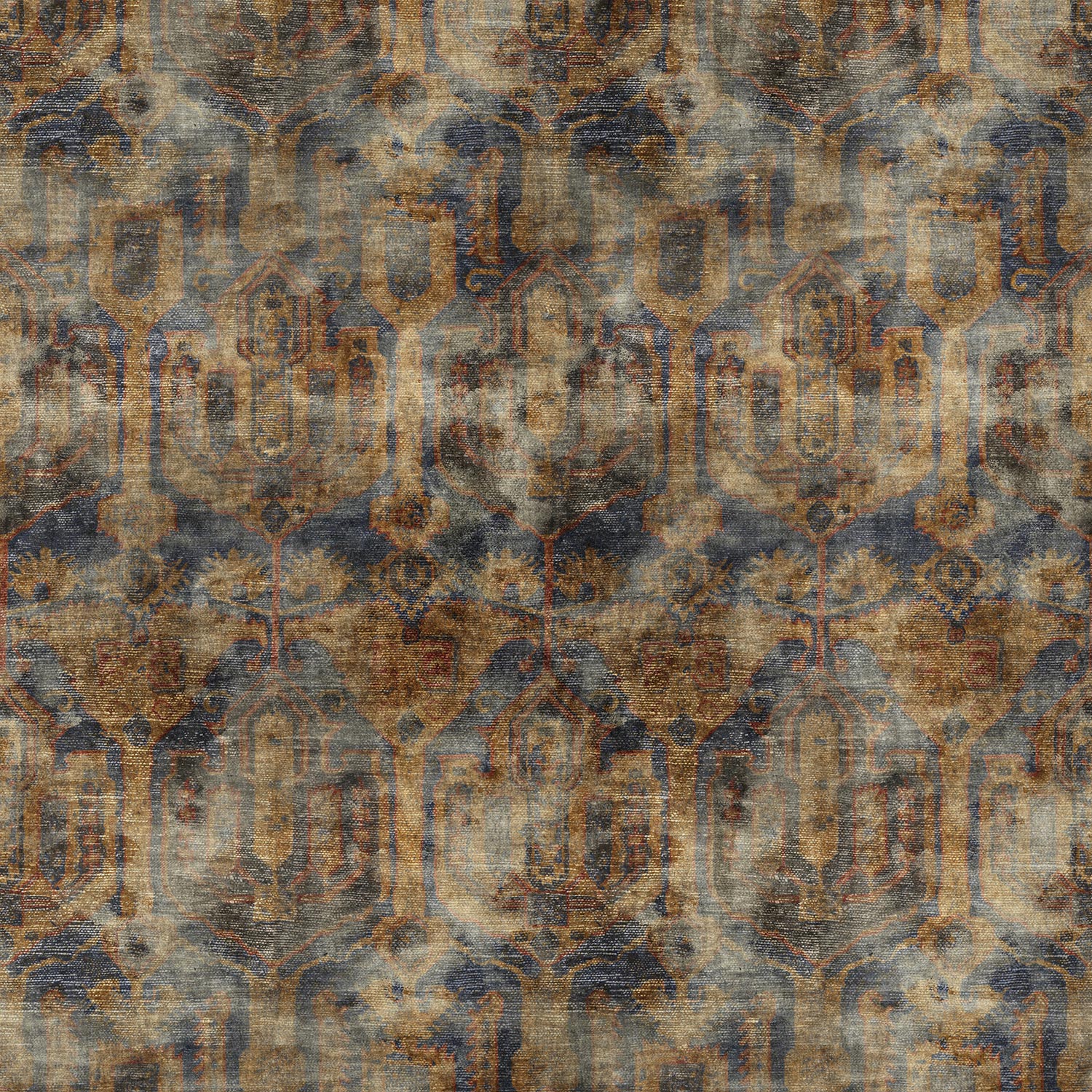 A printed velvet fabric sample in blue, brown and black featuring an opulent pattern.