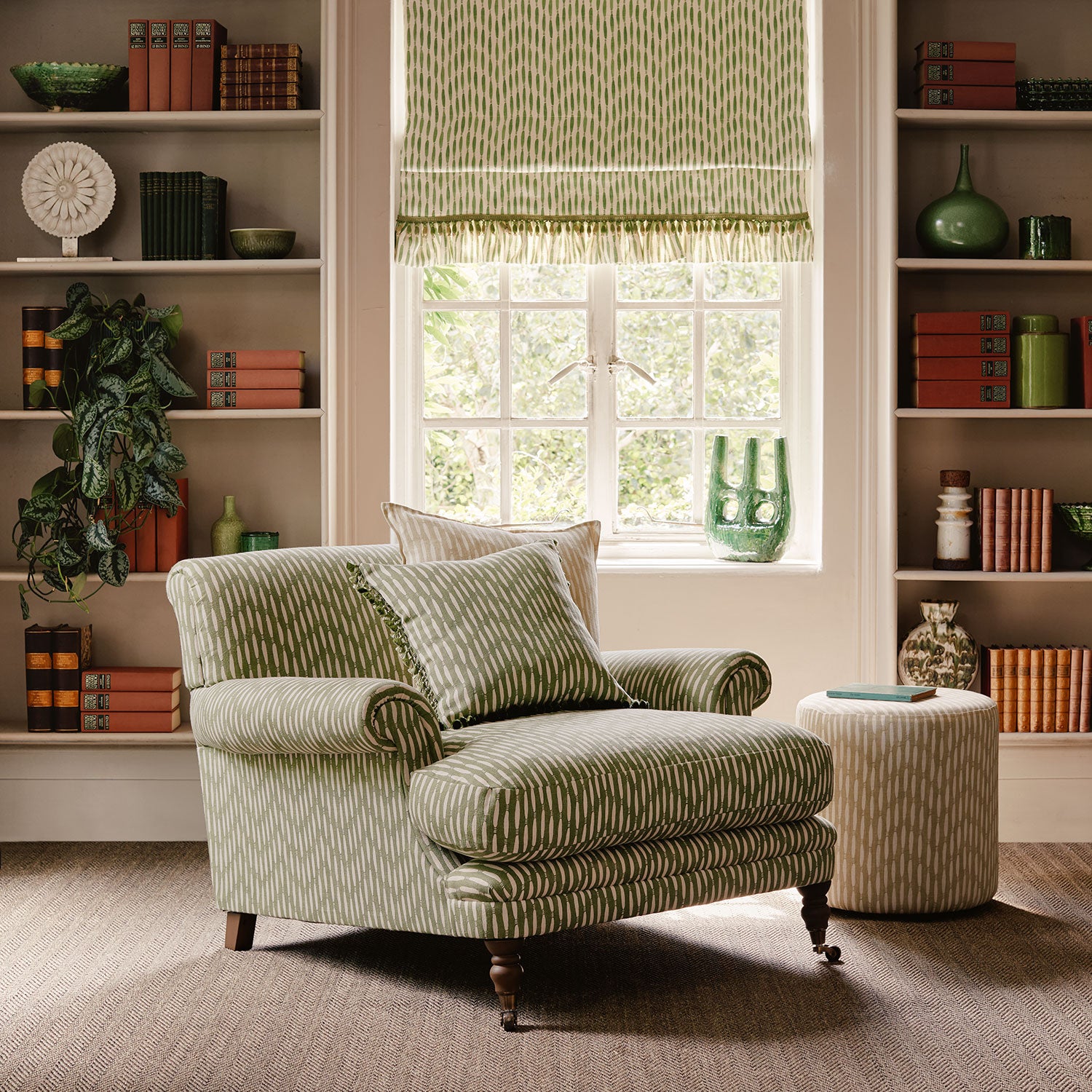 Armchair upholstered in a printed linen fabric in green and off white featuring a Japanese print.