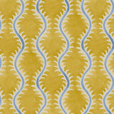 A printed linen fabric sample in yellow, blue and off white featuring a stylized fern pattern.