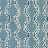 A printed linen fabric sample in blue and off white featuring a stylized fern pattern.