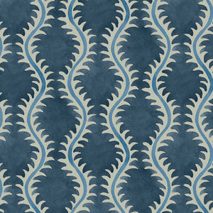 A printed linen fabric sample in blue and off white featuring a stylized fern pattern.