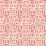 A printed linen fabric sample in red, pink and off white featuring a basketweave pattern.