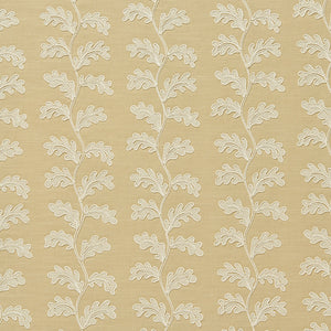 Decorative oakleaf embroidery on a beige background.