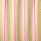 Embroidery fabric with wavy lines and small dots on a pink background.