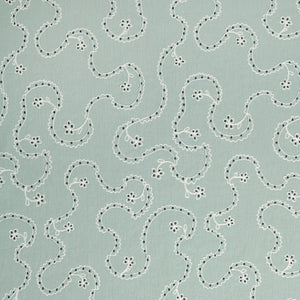 White embroidery pattern on a light blue background.