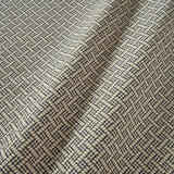 A woven fabric sample in blue and off-white featuring a trellis pattern.