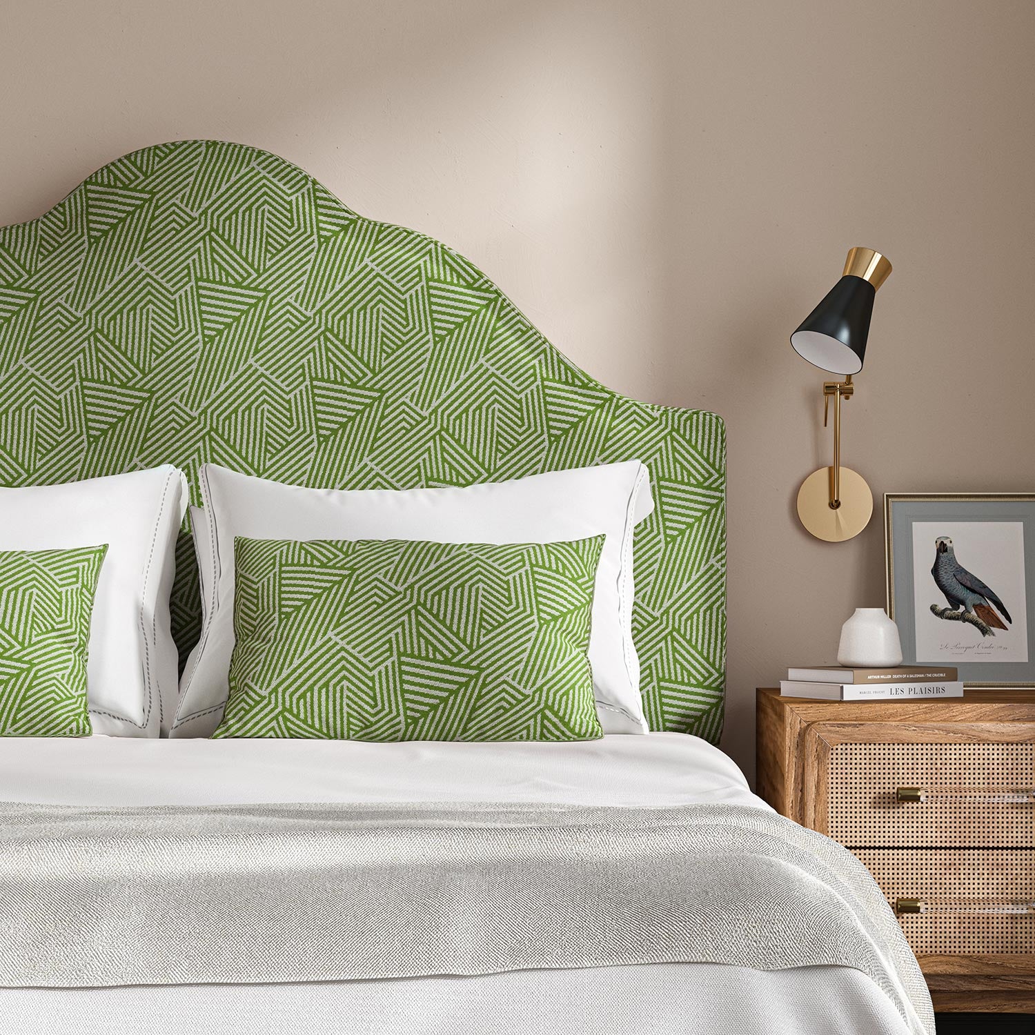 Headboard upholstered in a green and off-white woven fabric featuring a geometric pattern.