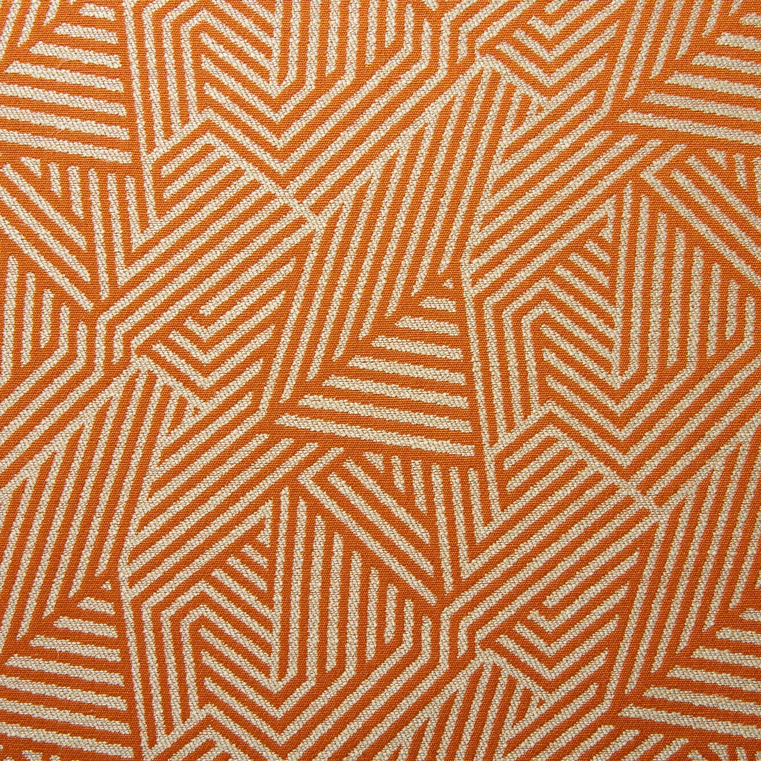 A woven fabric sample in orange and off-white featuring a geometric pattern.