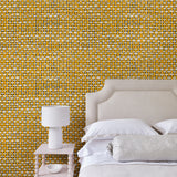 Bedroom with yellow wallpaper with faux basketweave pattern