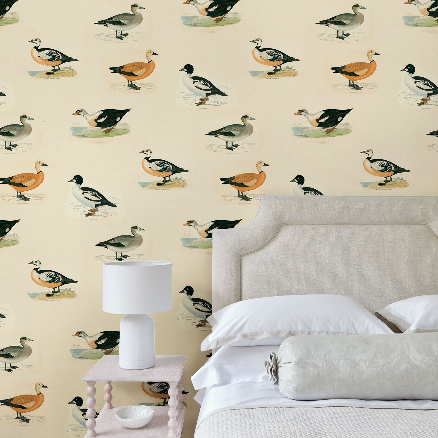 Animal wallpaper featuring ducks in a bedroom.