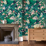 Living room featuring a smart, tropical wallpaper.