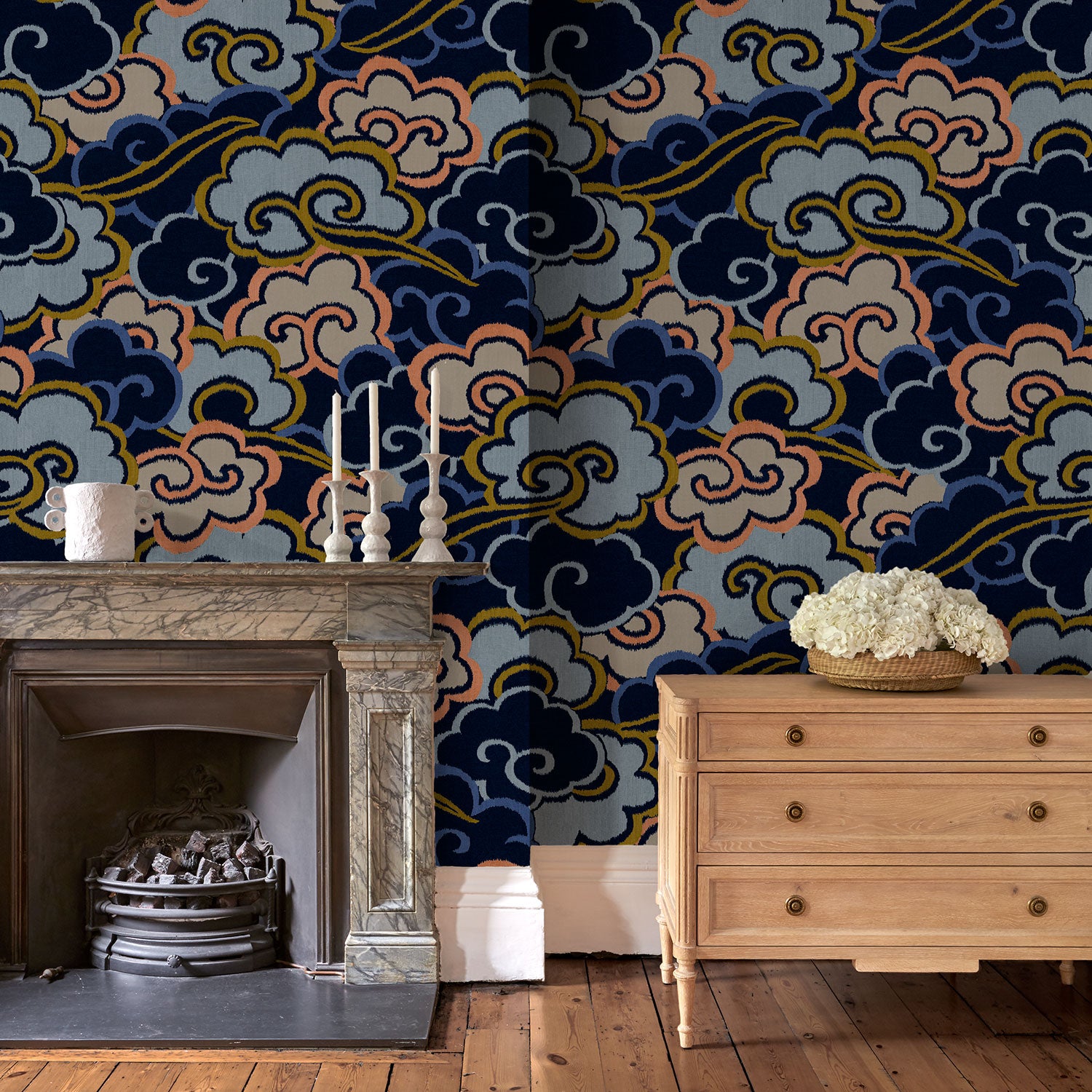 Inspired by a Japanese kimono, this designer wallpaper features an enchanting pattern of large abstract clouds.