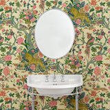 Presented in a fresh, inviting colour palette, this designer wallpaper features parrots, lions and exotic flowers.