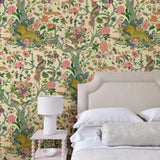 Presented in a fresh, inviting colour palette, this designer wallpaper features parrots, lions and exotic flowers.
