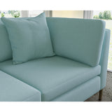 Sofa covered in plain fabric, colour Sky.