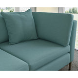 Sofa covered in plain fabric, colour Aegean.