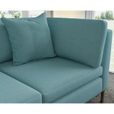 Sofa covered in plain fabric, colour Oxford Blue.