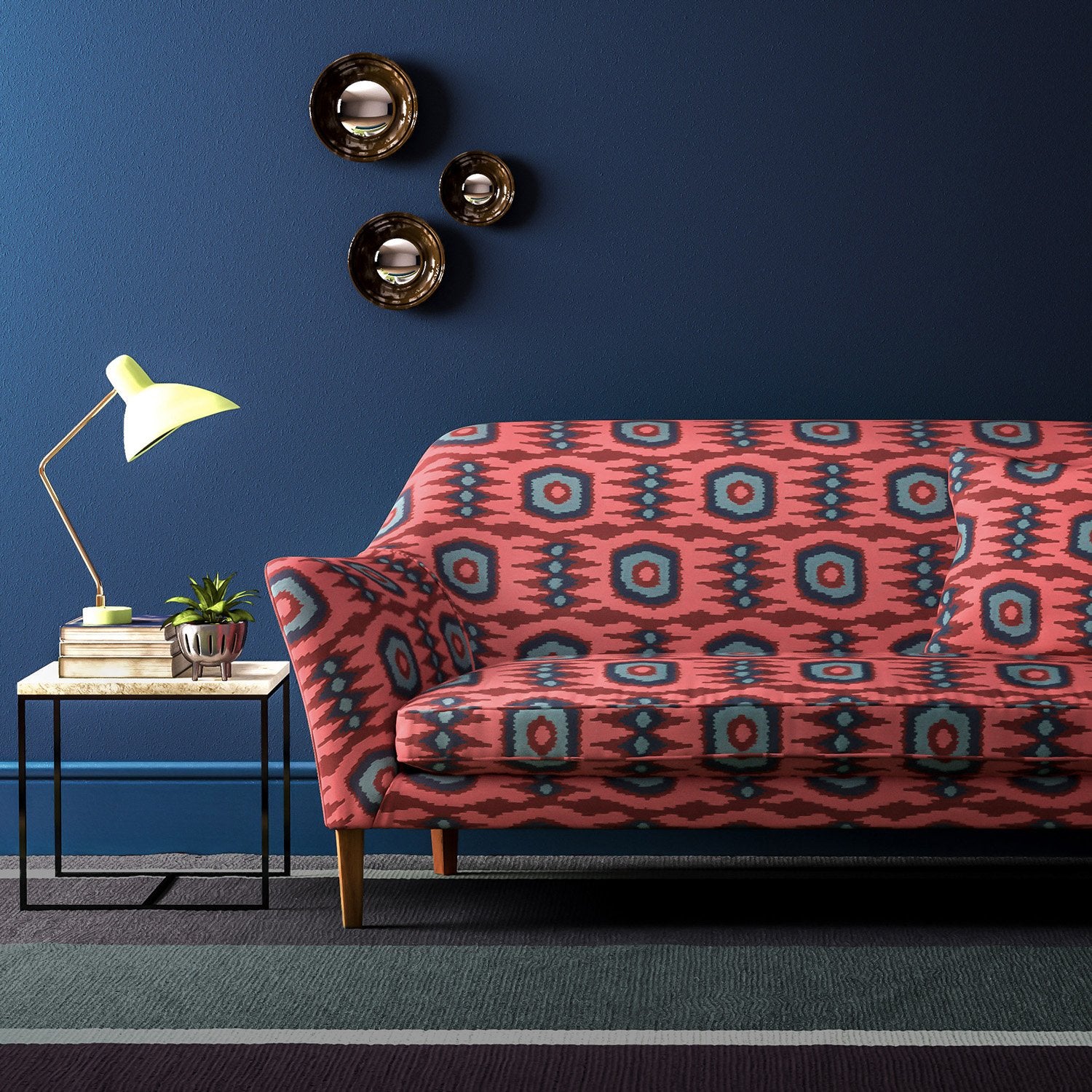 Sofa covered in a printed velvet upholstery fabric featuring a fun, jazzy pattern in Rosewood. 