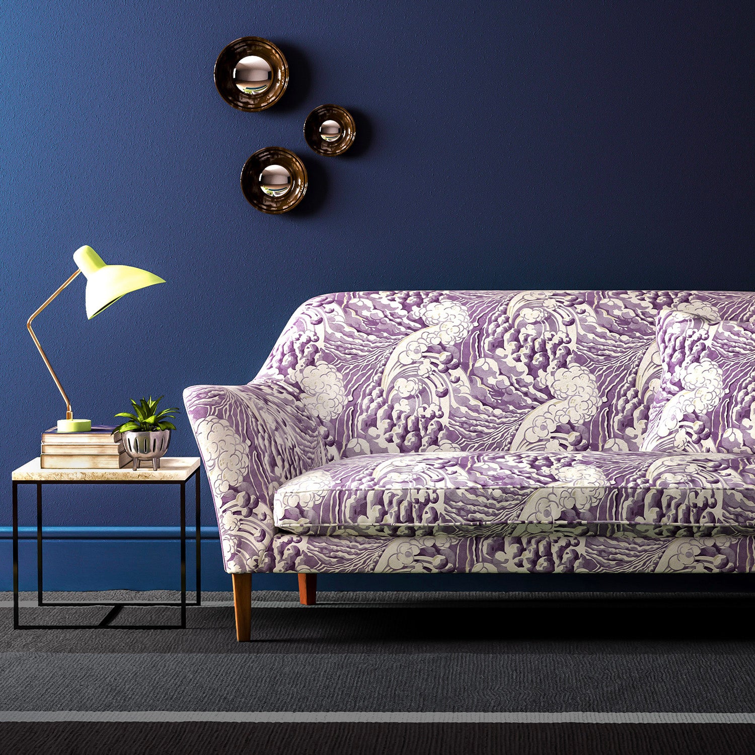 Velvet sofa upholstered in a purple and white velvet upholstery fabric with a wave design and stain resistant finish