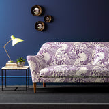 Velvet sofa upholstered in a purple and white velvet upholstery fabric with a wave design and stain resistant finish