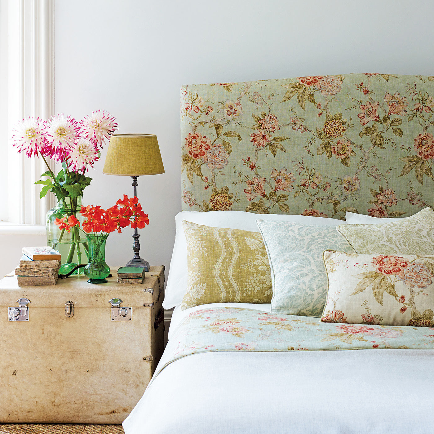 Headboard upholstered in a luxury light blue vintage inspired floral fabric