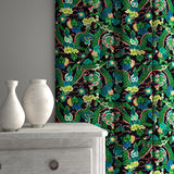 Velvet curtains upholstered in a printed velvet fabric with a intricate mirror dragon design in green colours.