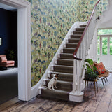 Staircase with a tropical wallpaper featuring a mystical scenic landscape.