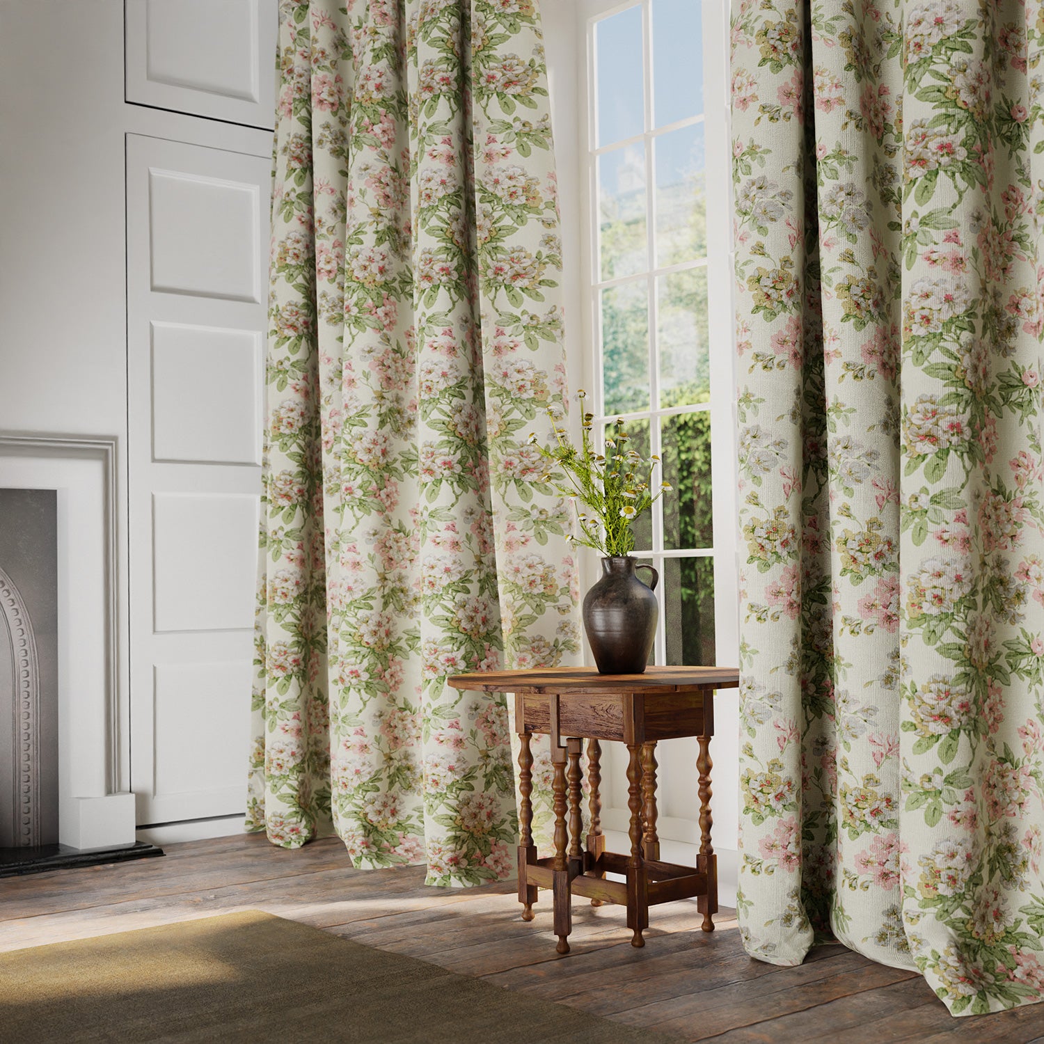 Curtains in a printed linen fabric with floral pattern in green, pink and white.