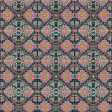 Printed velvet fabric with an oriental geometric design in vibrant colours, for upholstery and curtain use