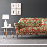 Velvet sofa upholstered in a printed velvet fabric with an oriental geometric design in multicolours