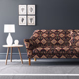 Velvet sofa upholstered in a printed velvet fabric with an oriental geometric design in multicolours