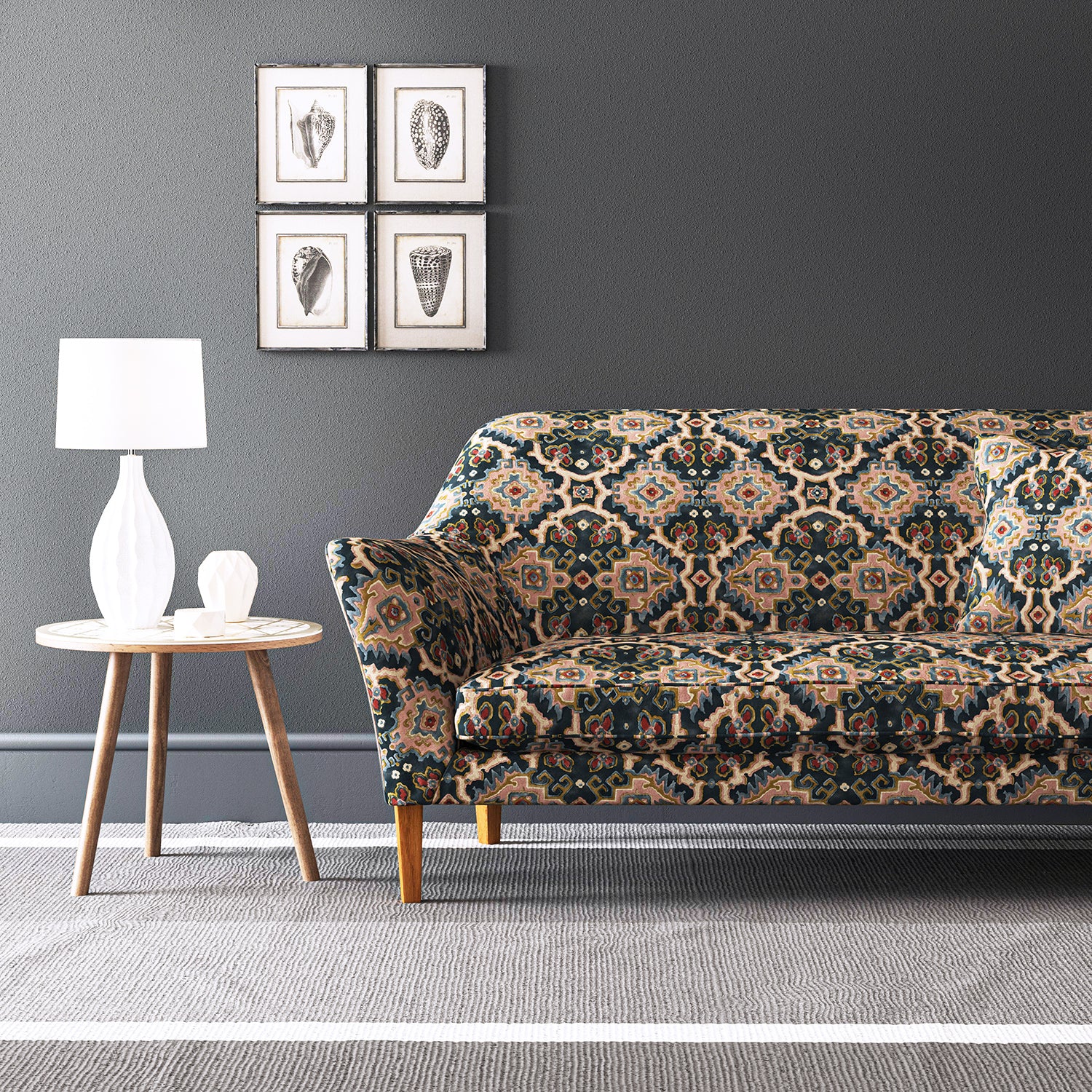 Velvet sofa upholstered in a printed velvet fabric with an oriental geometric design in multicolours