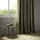 Curtains in a khaki Scottish wool herringbone fabric