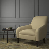 Chair upholstered in a luxury Scottish plain beige wool upholstery fabric