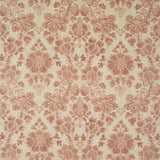 Fabric swatch of a light red floral damask fabric for curtains and upholstery