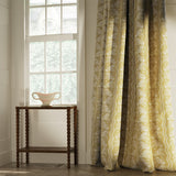 Curtains in a classic yellow floral fabric with stripe design