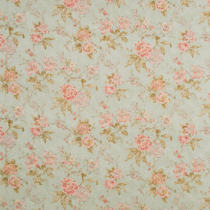 Fabric swatch of a light blue vintage inspired floral design fabric for curtains and upholstery