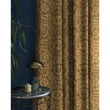 Curtain in a gold and white velvet fabric with intricate jewel design
