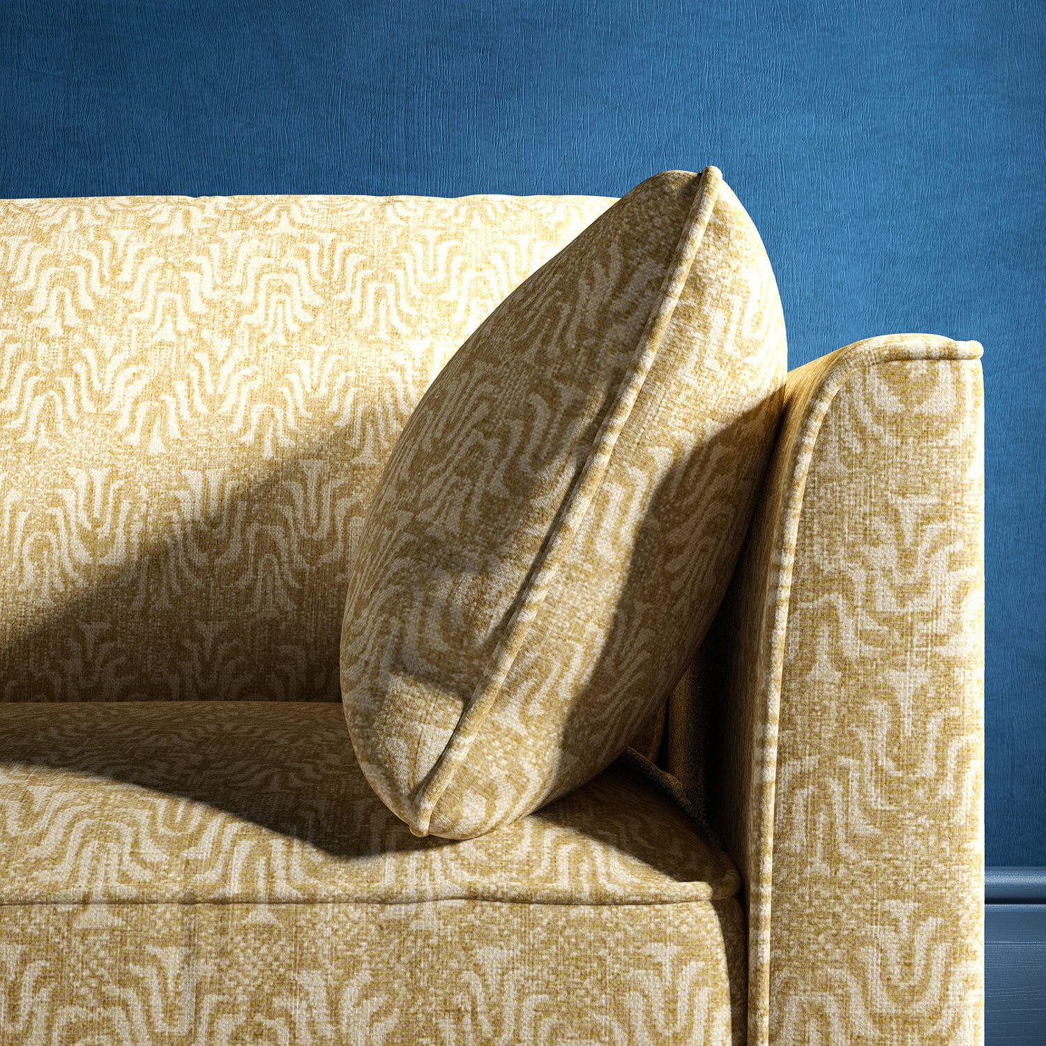 Sofa upholstered in a neutral jacquard weave upholstery fabric